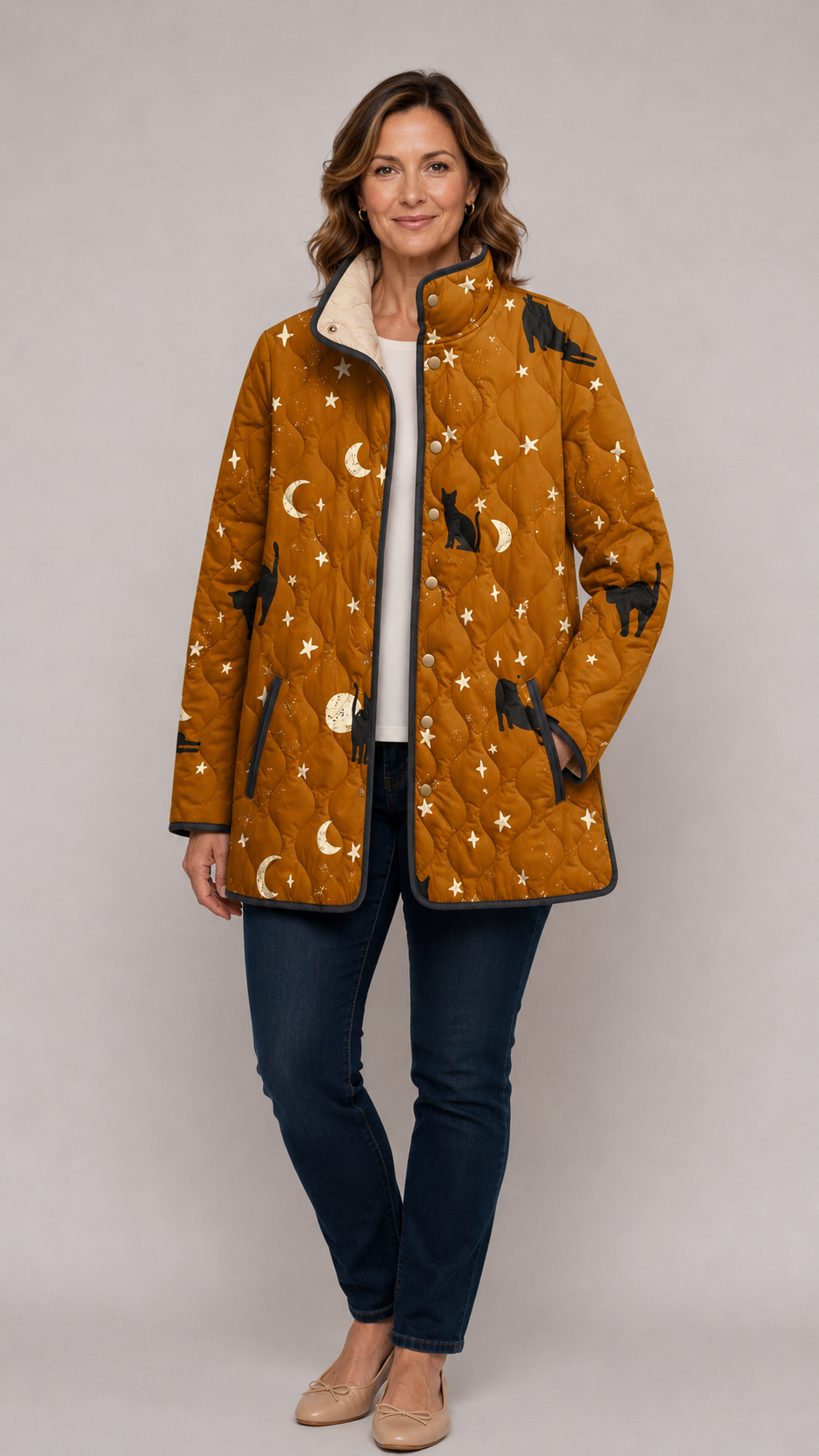 Maya | Schwarze gesteppte Jacke mit Katzenmuster