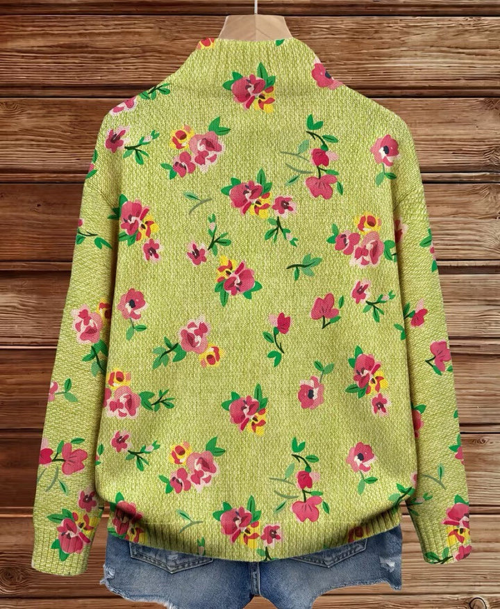 Lauren | Strickjacke mit rosa Blüten und grünem Reißverschluss